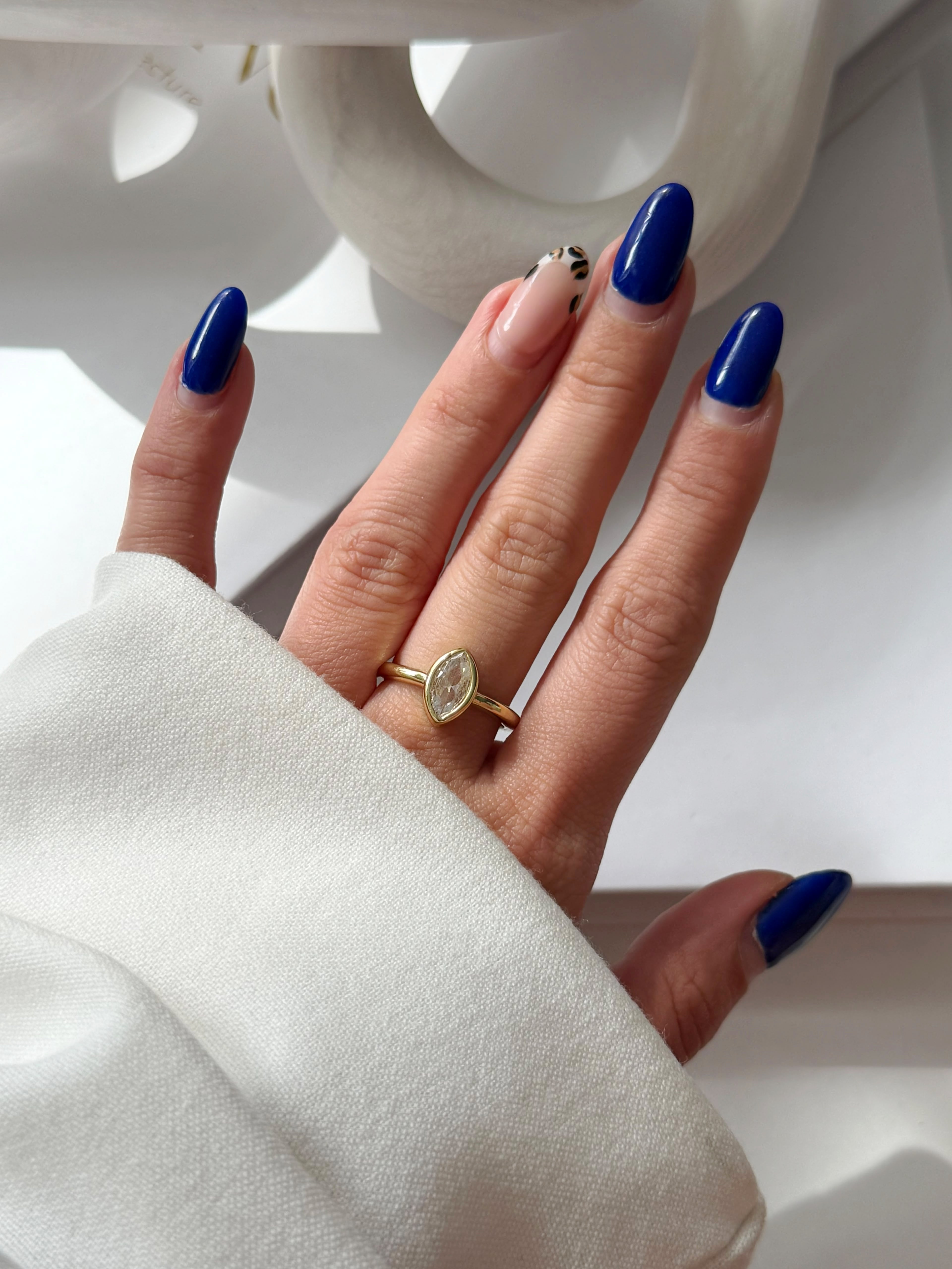 CW1RING0016-gold-bezel-set-marquise-cz-solitaire-ring-catwalkjewellery wholesale jewelry RINGS Catwalk Jewellery Europe