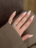 CW1RING0093-gold-baguette-and-round-cz-cluster-spiral-bypass-ring-catwalkjewellery wholesale jewelry RINGS Catwalk Jewellery Europe